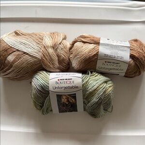 Red Heart Unforgettable 
Size:3.5 oz 
Color: 2-cappuccino 1-meadow